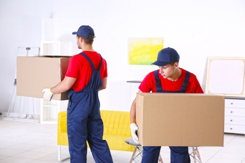 Local house removals team working in a Tooting residential street