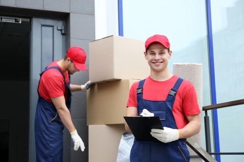 Moving team preparing safely with protective equipment during a relocation