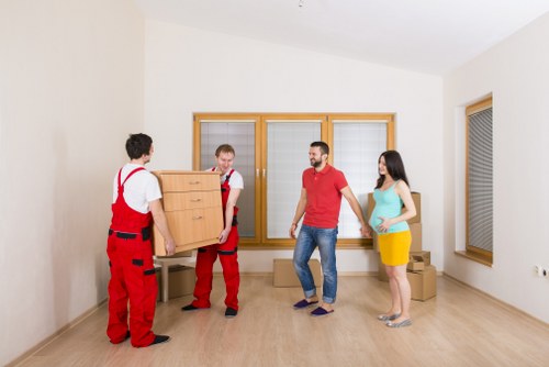 Professional movers handling furniture during a Tooting relocation