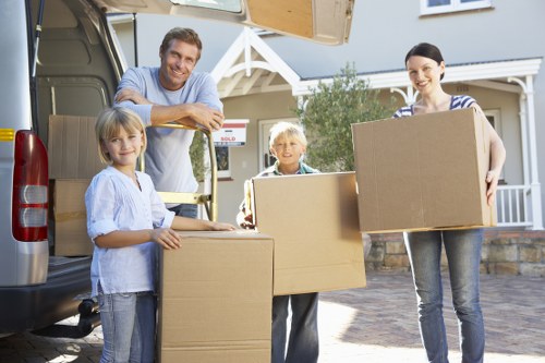 Local moving team handling a residential packing service in South West London