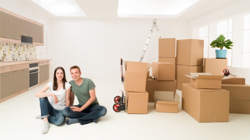Loading furniture and boxes into a van for a Tooting customer