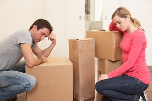 Organised workplace relocation setup with labelled boxes and office furniture